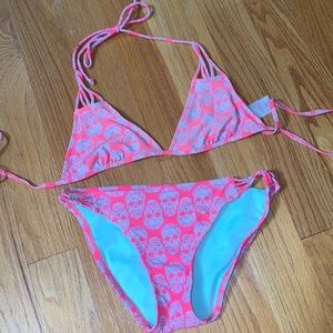 Hot pink skull bathing suit